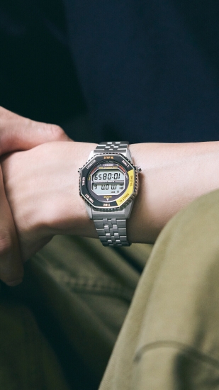 Seiko Herrenuhr "Rotocall“ Digital Alarm 10BAR Gelb 37mm SMGG17P1